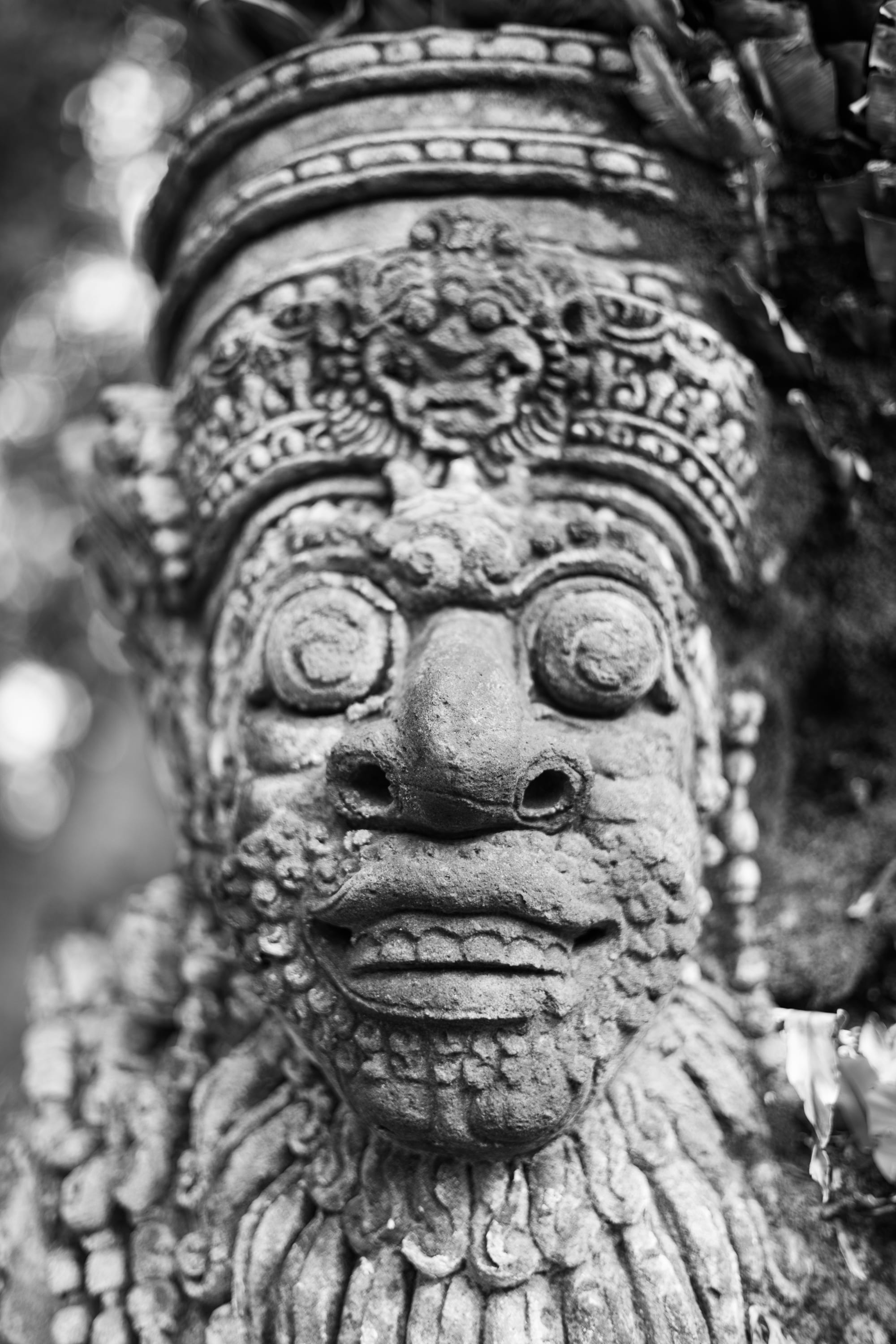 Balinese stone statue in black and white