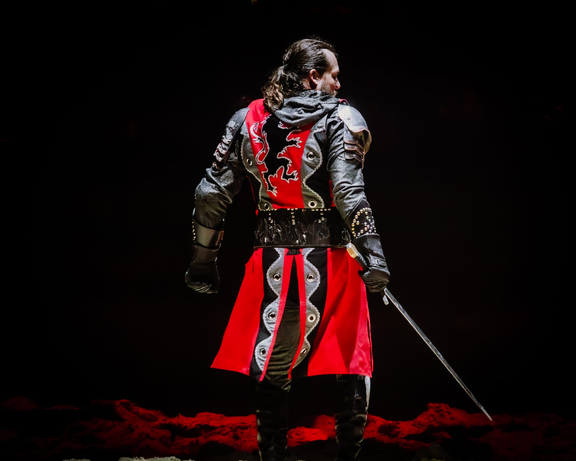 Medieval knight with red cape