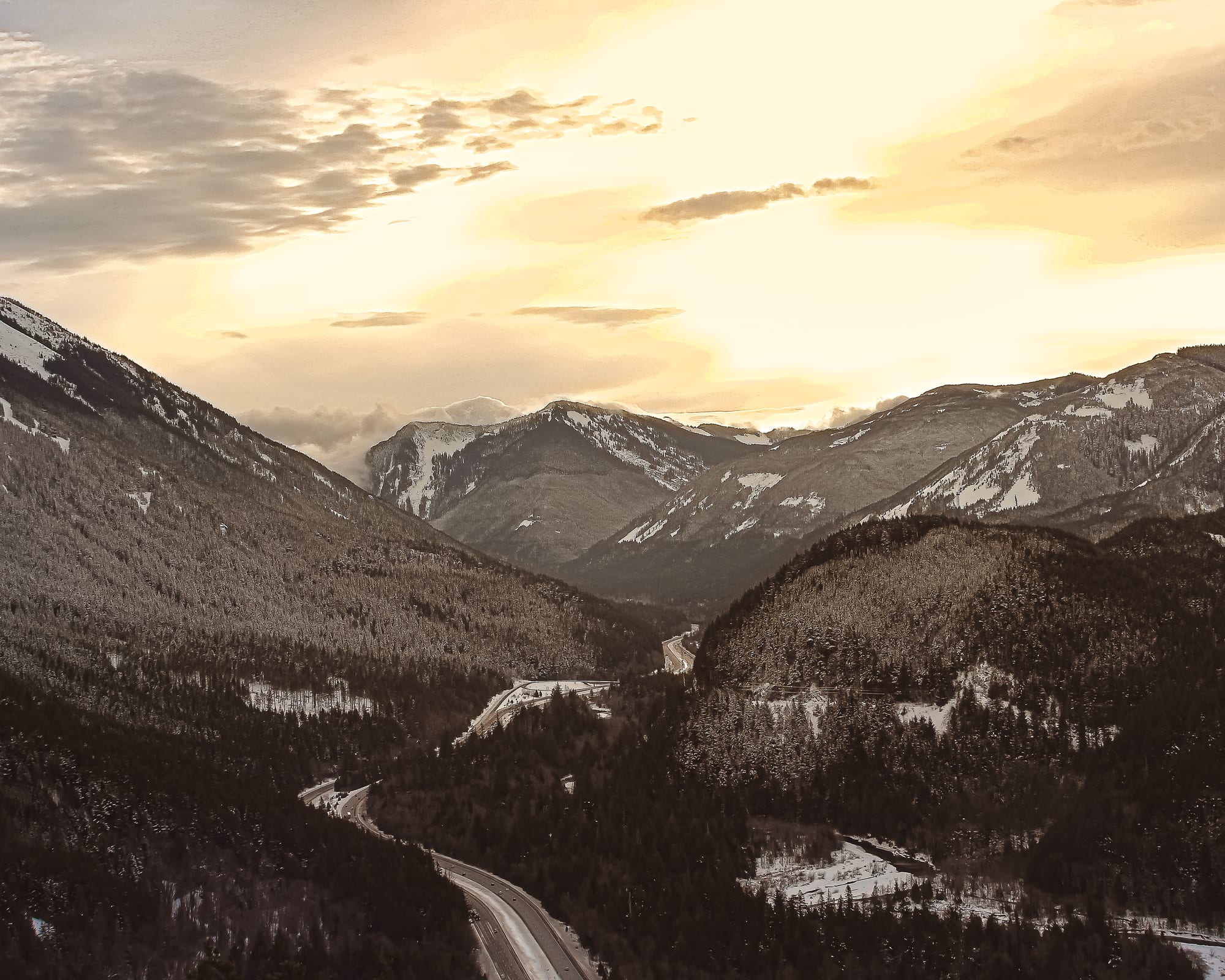 Golden sunset over mountain road