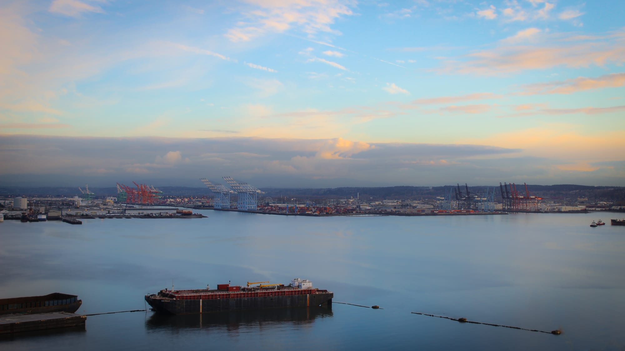 Harbor at dusk with pastel sky